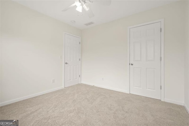 606 Hay Meadow Pl, Acworth, GA 30102 - unfurnished bedroom with carpet flooring, baseboards, and ceiling fan