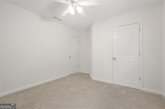 606 Hay Meadow Pl, Acworth, GA 30102 - unfurnished bedroom with light colored carpet and ceiling fan
