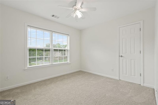 606 Hay Meadow Pl, Acworth, GA 30102 - carpeted spare room with baseboards and a ceiling fan