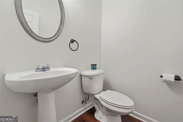 606 Hay Meadow Pl, Acworth, GA 30102 - bathroom with baseboards and wood finished floors