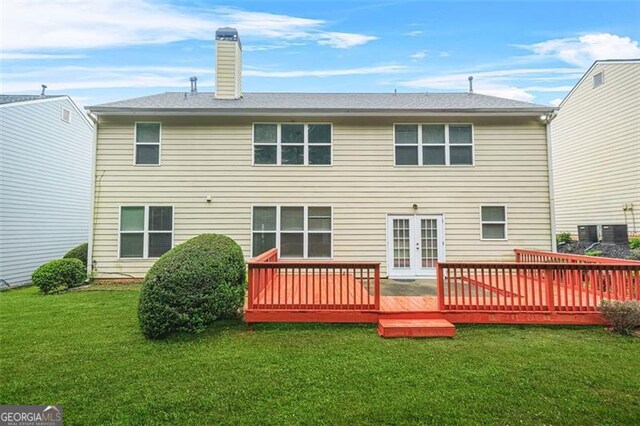 606 Hay Meadow Pl, Acworth, GA 30102 - back of house featuring french doors, a wooden deck, a yard, and a chimney