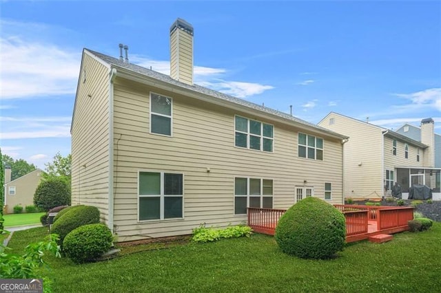 606 Hay Meadow Pl, Acworth, GA 30102 - rear view of property with a chimney, a yard, and a deck