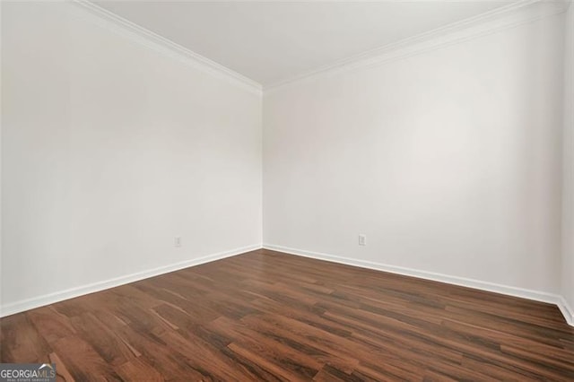 606 Hay Meadow Pl, Acworth, GA 30102 - empty room featuring ornamental molding, baseboards, and dark wood finished floors