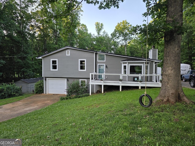 245 Freestone Dr, Newnan, GA 30265 - view of front of property with a chimney, concrete driveway, an attached garage, a front yard, and a deck