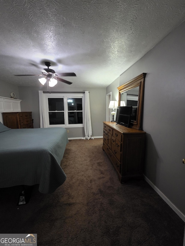 245 Freestone Dr, Newnan, GA 30265 - carpeted bedroom with baseboards, a ceiling fan, and a textured ceiling