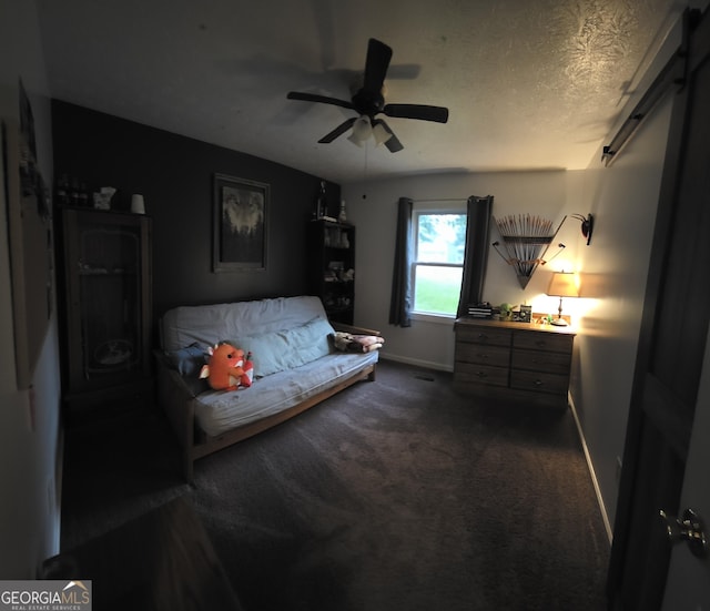 245 Freestone Dr, Newnan, GA 30265 - bedroom featuring baseboards, dark colored carpet, and ceiling fan
