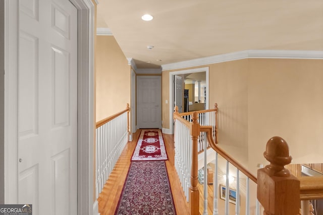 1014 Overlook Dr, Villa Rica, GA 30180 - hallway featuring ornamental molding, an upstairs landing, and light wood-style floors