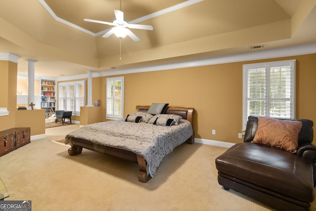 1014 Overlook Dr, Villa Rica, GA 30180 - bedroom featuring a raised ceiling, light colored carpet, multiple windows, and ornamental molding