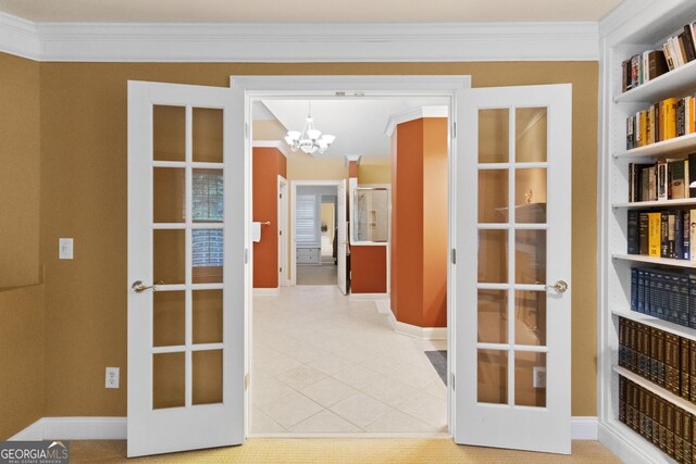 1014 Overlook Dr, Villa Rica, GA 30180 - interior space with french doors, a chandelier, crown molding, baseboards, and light tile patterned floors