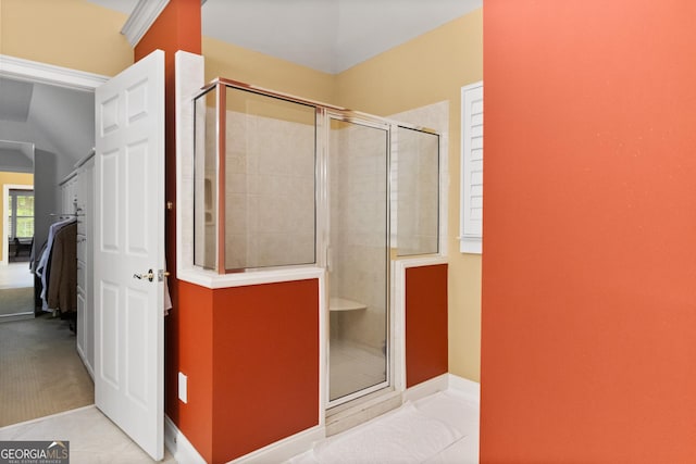 1014 Overlook Dr, Villa Rica, GA 30180 - bathroom with a shower stall, tile patterned floors, connected bathroom, and baseboards