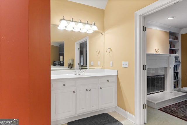 1014 Overlook Dr, Villa Rica, GA 30180 - bathroom with vanity, a high end fireplace, and baseboards
