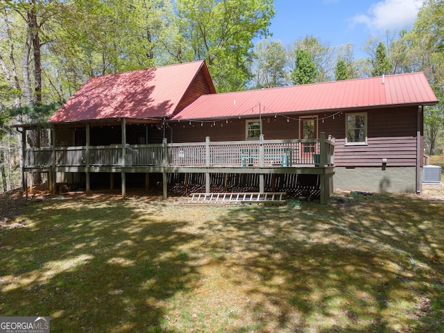 366 Crabapple Rdg, Clarkesville, GA 30523 - back of house featuring cooling unit, a lawn, metal roof, and a wooden deck