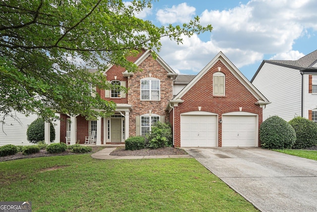 251 Sumac Trl, Woodstock, GA 30188 - view of front facade featuring concrete driveway, a front lawn, brick siding, and stone siding
