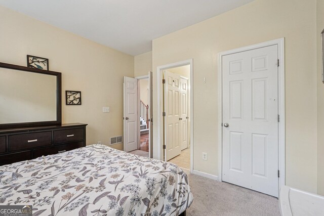 251 Sumac Trl, Woodstock, GA 30188 - bedroom with light colored carpet and baseboards