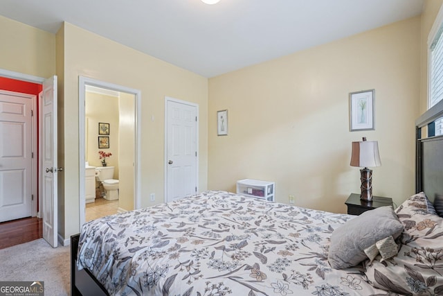 251 Sumac Trl, Woodstock, GA 30188 - bedroom featuring light carpet and connected bathroom