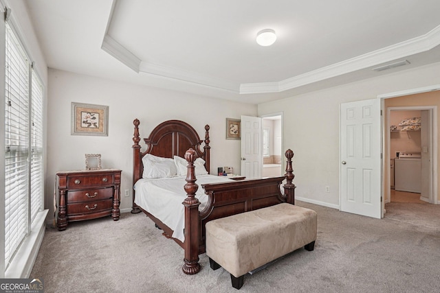 251 Sumac Trl, Woodstock, GA 30188 - bedroom featuring washer / dryer, ornamental molding, carpet flooring, and a tray ceiling