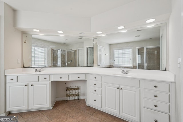 251 Sumac Trl, Woodstock, GA 30188 - bathroom featuring a shower stall, tile patterned flooring, double vanity, and recessed lighting