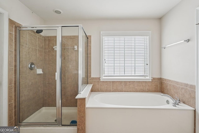 251 Sumac Trl, Woodstock, GA 30188 - full bathroom featuring a bath and a stall shower