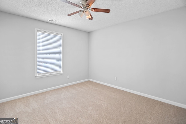 3315 Brookfield Dr, Austell, GA 30106 - carpeted empty room featuring a ceiling fan, baseboards, and a textured ceiling