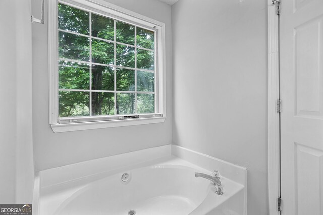 3315 Brookfield Dr, Austell, GA 30106 - full bathroom featuring healthy amount of natural light and a garden tub