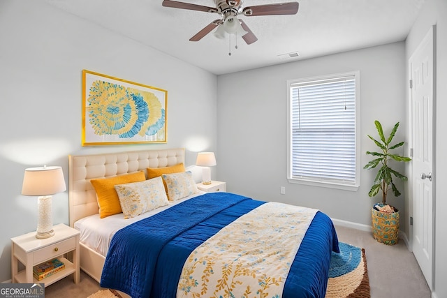 3315 Brookfield Dr, Austell, GA 30106 - carpeted bedroom with baseboards and ceiling fan