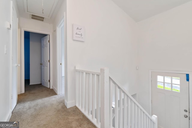 4651 Garden Hills Dr, Stone Mountain, GA 30083 - hall featuring attic access, an upstairs landing, carpet flooring, and baseboards