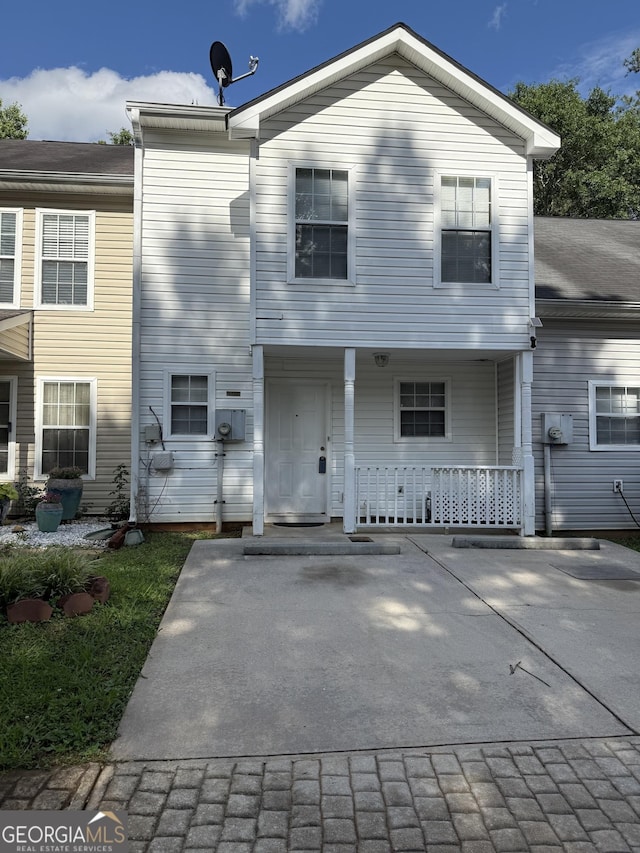 6550 Wellington Chase Ct, Lithonia, GA 30058 - townhome / multi-family property with covered porch