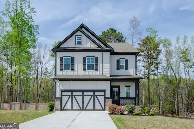 778 Laurel Cove Dr, Hoschton, GA 30548 - view of front of property featuring concrete driveway, an attached garage, brick siding, and a shingled roof