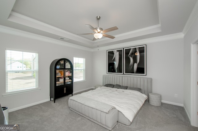 778 Laurel Cove Dr, Hoschton, GA 30548 - carpeted bedroom featuring a tray ceiling, ornamental molding, baseboards, and ceiling fan