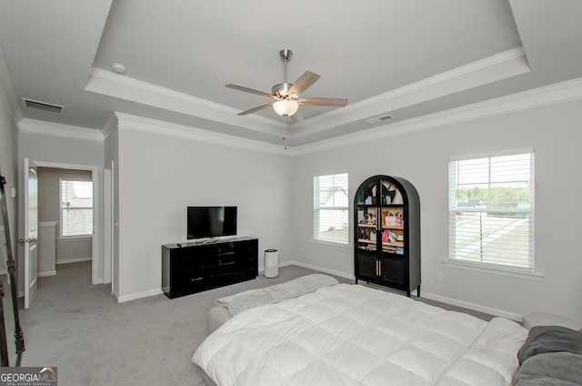 778 Laurel Cove Dr, Hoschton, GA 30548 - bedroom featuring a raised ceiling, baseboards, crown molding, light colored carpet, and a ceiling fan