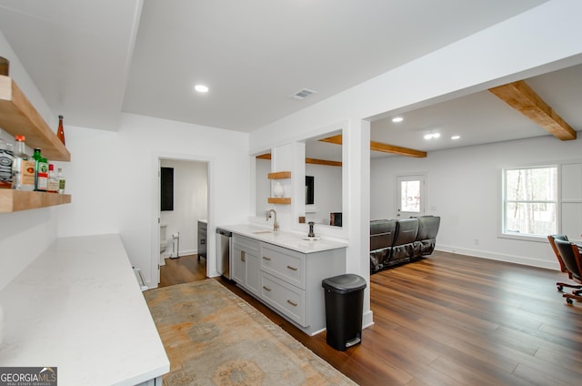 778 Laurel Cove Dr, Hoschton, GA 30548 - kitchen with open shelves, beam ceiling, dark wood-type flooring, open floor plan, and recessed lighting