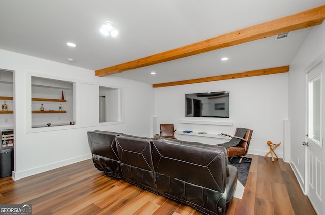 778 Laurel Cove Dr, Hoschton, GA 30548 - living room with beamed ceiling, wood finished floors, recessed lighting, and baseboards