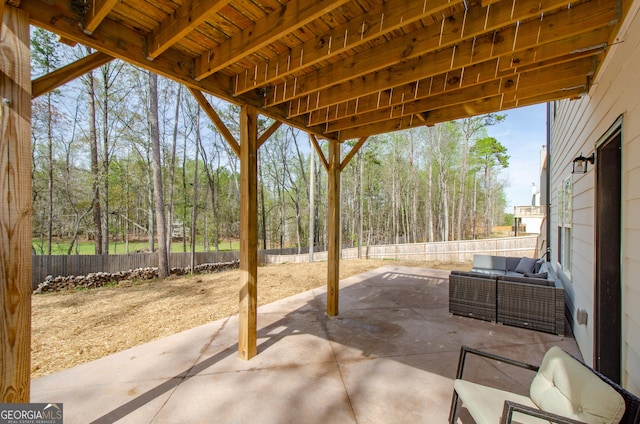 778 Laurel Cove Dr, Hoschton, GA 30548 - fenced backyard featuring a patio area and an outdoor living space