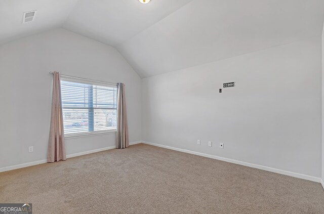 4580 Cloister Cir, Hampton, GA 30228 - unfurnished room featuring vaulted ceiling and carpet floors