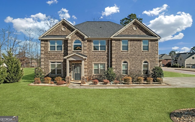 4580 Cloister Cir, Hampton, GA 30228 - view of front of home featuring a front lawn and brick siding
