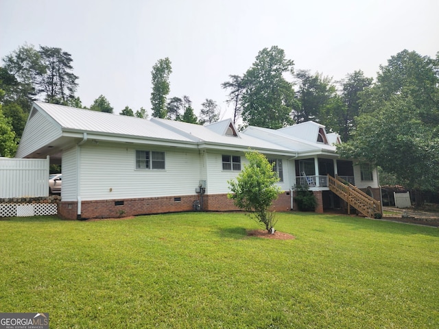 1470 Dunn Rd, Cumming, GA 30040 - rear view of property featuring crawl space, a lawn, stairs, and metal roof