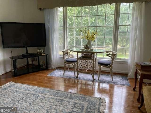 1470 Dunn Rd, Cumming, GA 30040 - dining area featuring wood finished floors and baseboards