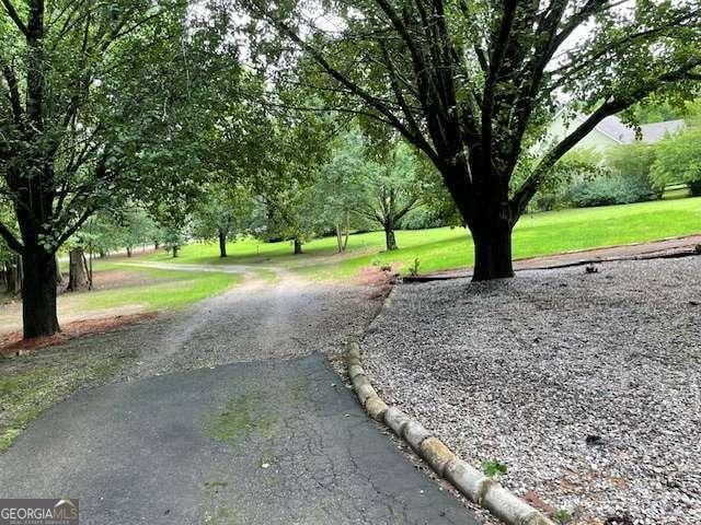 1470 Dunn Rd, Cumming, GA 30040 - surrounding community with a lawn