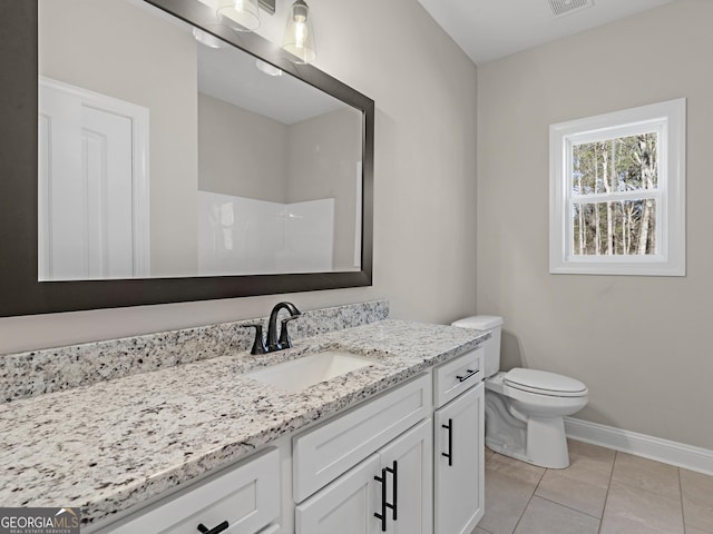 1847 Davis Mill Rd N, Dallas, GA 30157 - bathroom featuring vanity, toilet, a shower, tile patterned floors, and baseboards