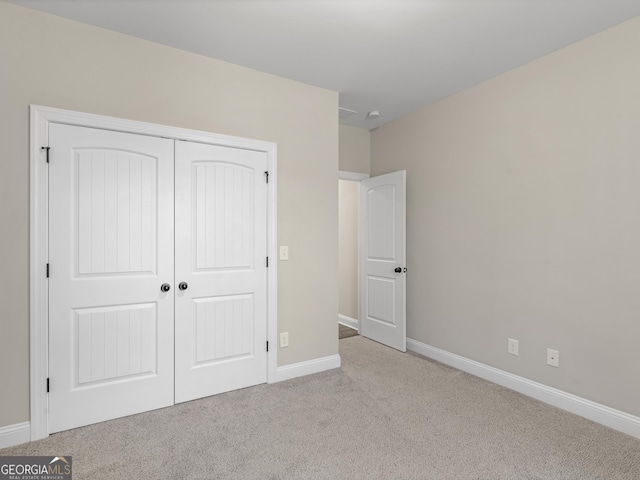1847 Davis Mill Rd N, Dallas, GA 30157 - unfurnished bedroom featuring carpet floors, a closet, and baseboards