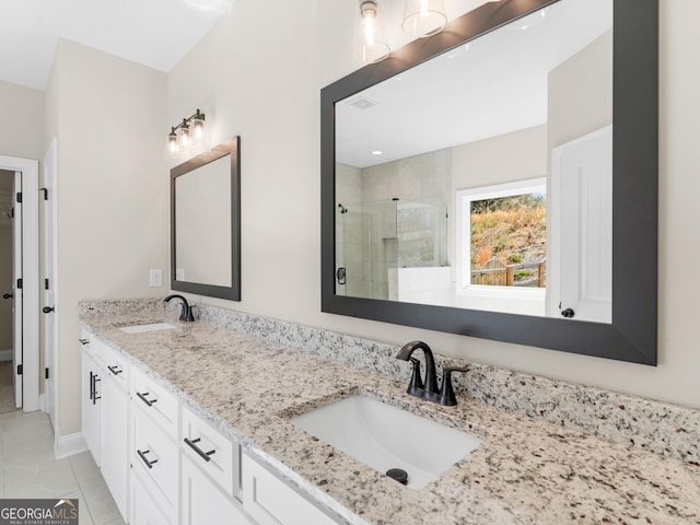 1847 Davis Mill Rd N, Dallas, GA 30157 - bathroom with a stall shower, double vanity, and baseboards
