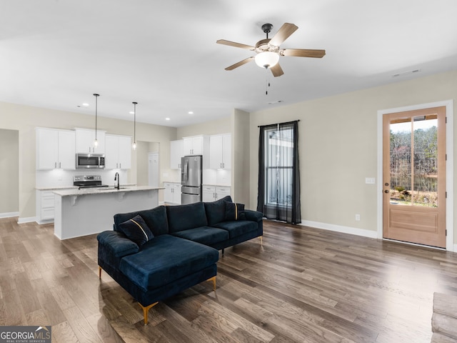 1847 Davis Mill Rd N, Dallas, GA 30157 - living room with wood finished floors, ceiling fan, baseboards, and recessed lighting