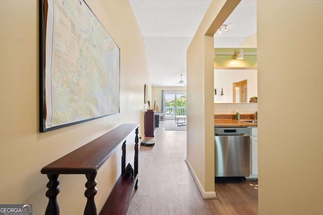 226 Bull River Bluff Dr, Savannah, GA 31410 - hall featuring dark wood-style floors, a sink, and baseboards