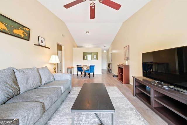 226 Bull River Bluff Dr, Savannah, GA 31410 - living area featuring a ceiling fan, vaulted ceiling, wood finished floors, and baseboards