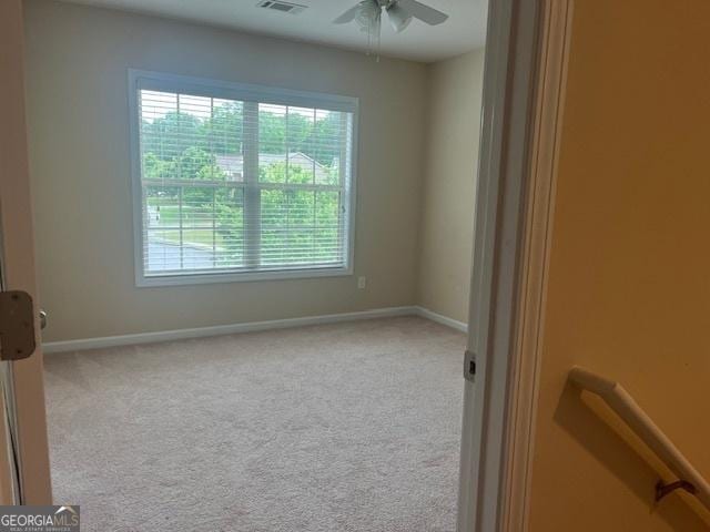 82 Sweetwater Way, Senoia, GA 30276 - empty room with ceiling fan, baseboards, and carpet flooring
