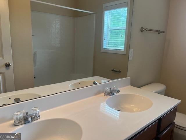 82 Sweetwater Way, Senoia, GA 30276 - full bath featuring toilet, double vanity, and a shower