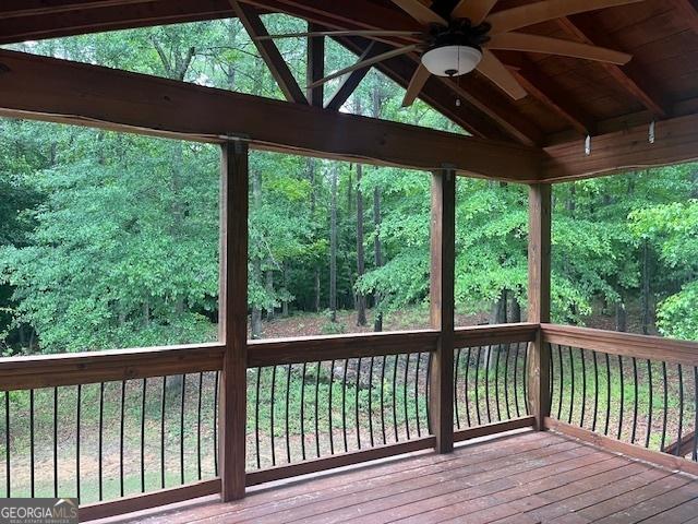 82 Sweetwater Way, Senoia, GA 30276 - wooden deck featuring ceiling fan and a forest view