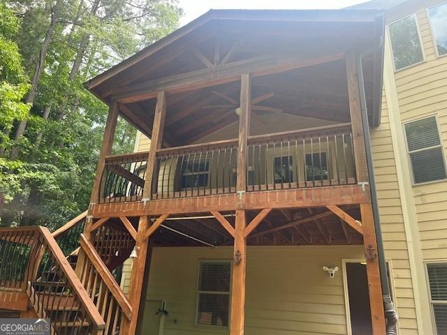 82 Sweetwater Way, Senoia, GA 30276 - back of house featuring a wooden deck