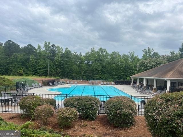 82 Sweetwater Way, Senoia, GA 30276 - community pool featuring a patio area
