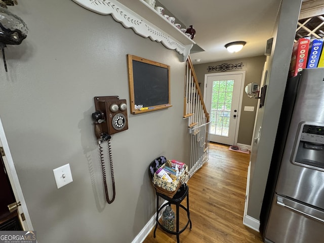509 White Pine Cir, Demorest, GA 30535 - corridor with wood finished floors, baseboards, and stairway